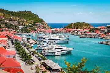 Luxurious yacht docked in the harbor of St. Barts.